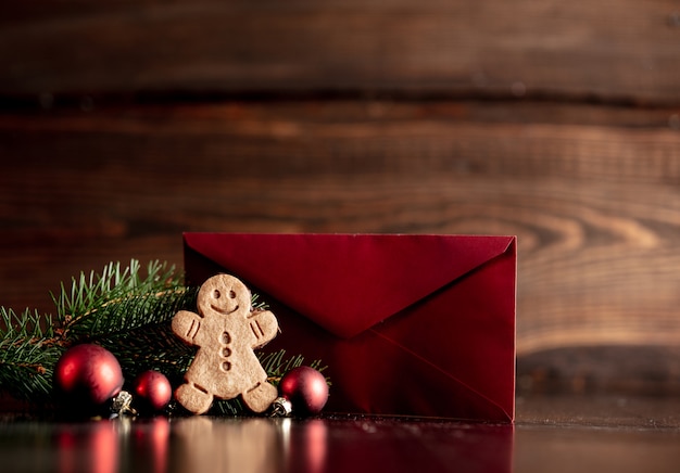 Gingerbread man and Christmas tree with red envelope