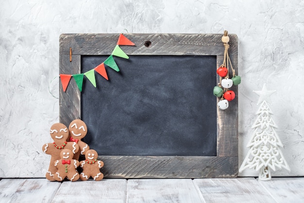 Gingerbread man family and chalkboard