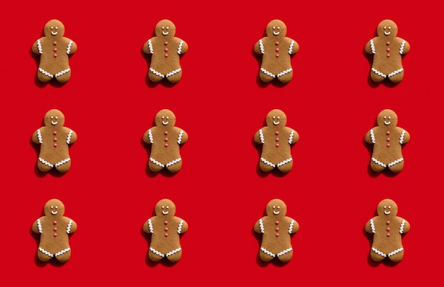 Gingerbread man pattern red seamless background