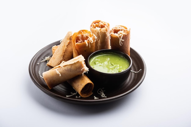 Gini or Jini Dosa is a mumbai style street food variety served in a plate with green chutney