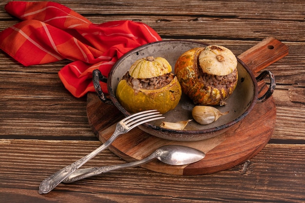 Giraumon or turbaned pumpkin stuffed with meat in an old dish