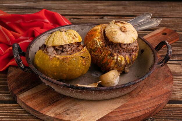 Giraumon or turbaned pumpkin stuffed with meat in an old dish