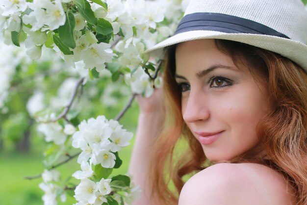 Girl in apple garden flower