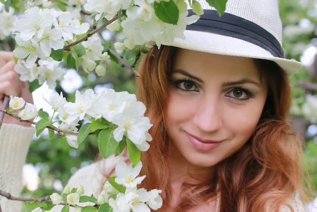 Girl in apple garden flower