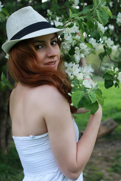 Girl in apple garden flower