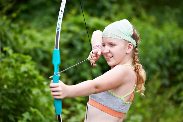 Girl archer with bow and arrow