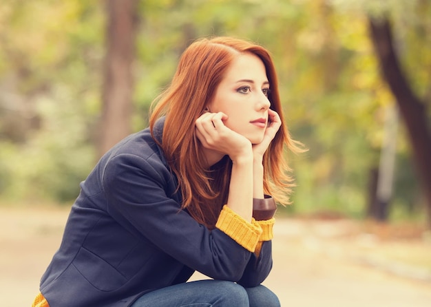 Girl at autumn outdoor