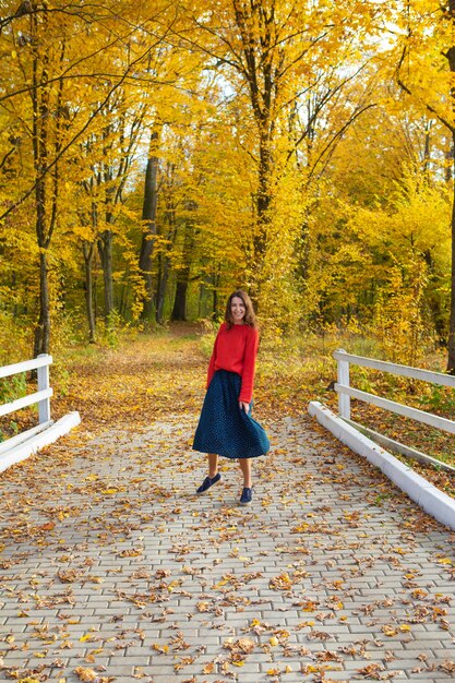 Girl in autumn park