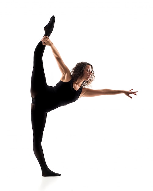 Girl ballet dancer on isolated white background