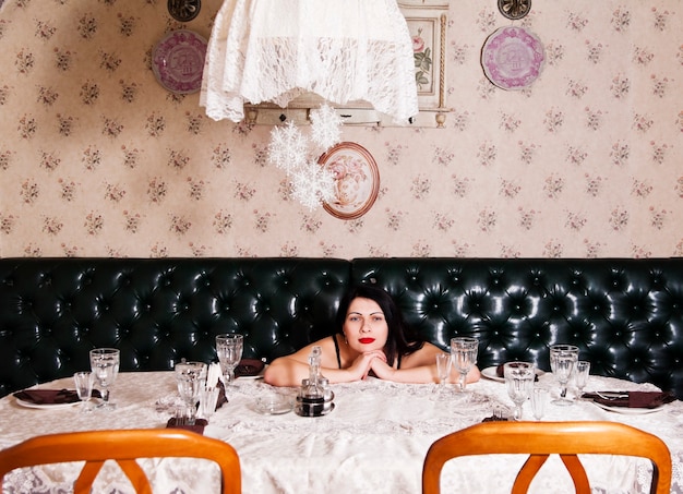 Photo girl at the banquet table