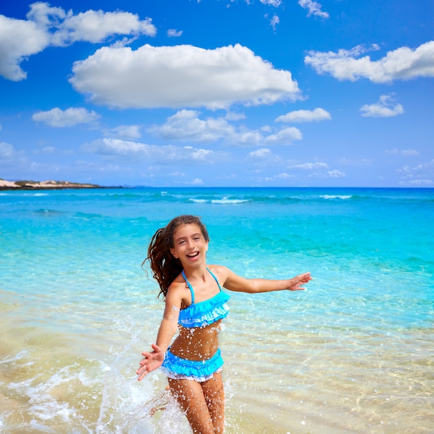 Girl on the beach Fuerteventura at Canary Islands 