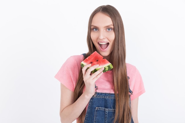 Girl biting watermelon