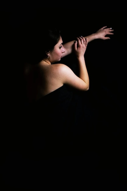 Girl on a black background