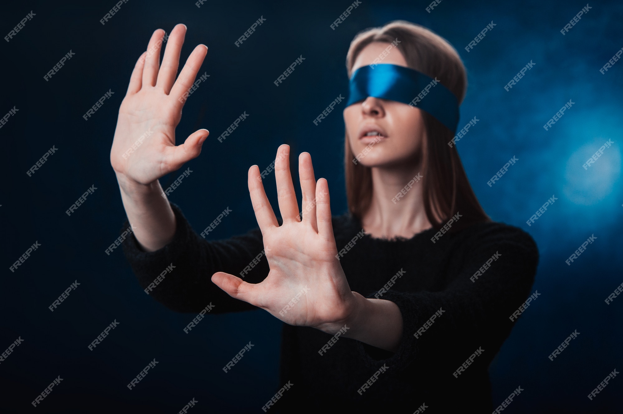 Blindfold Surprise, Close up of blindfolded woman holding s…