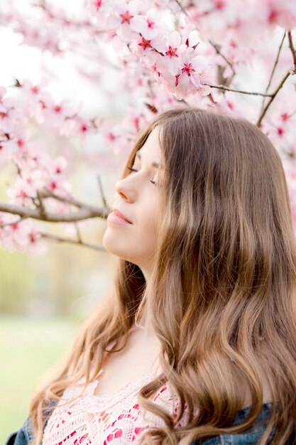 Girl in blooming tree