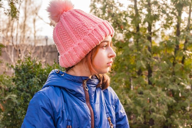 Girl in a blue jacket winter