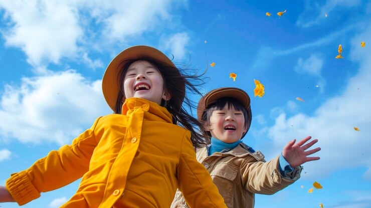 Photo 青い空の微笑みの中の強い風の中の女の子と男の子