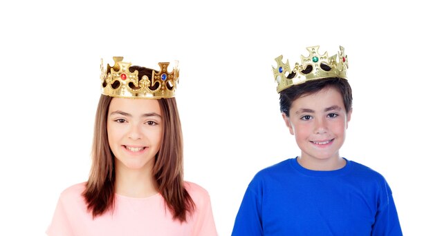 A girl and a boy with golden crowns on their heads 