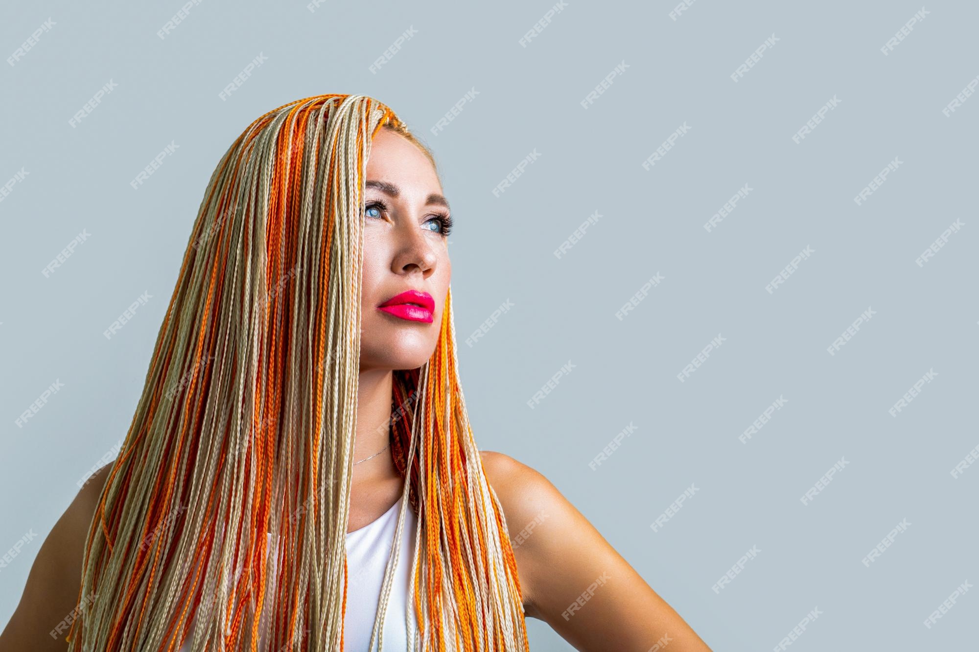 Premium Photo | Girl braids portrait of beautiful young girl with braids  beautiful stylish woman with colorful kanekalon braided in her hair pretty  woman colorful orange hair braids hairdresser salon concept