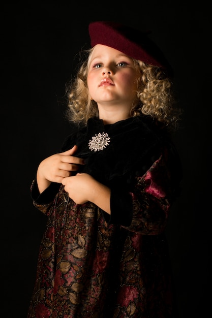 Girl in brown old-fashioned costume