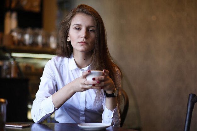 The girl in the cafe breakfast