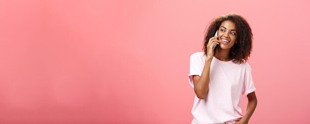 Photo girl calling friend to meet up portrait of charming friendly and outgoing african american young