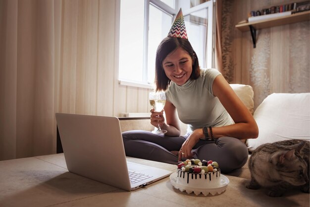 Girl celebrating birthday online in quarantine time