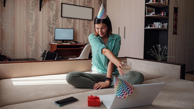 Girl celebrating birthday online in quarantine time