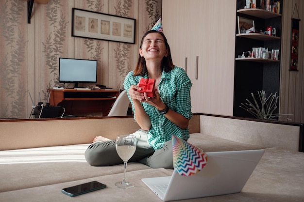 Girl celebrating birthday online in quarantine time