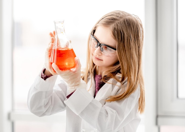 Girl on chemistry lesson