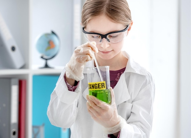 Girl on chemistry lesson