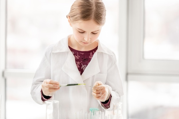 Girl on chemistry lesson