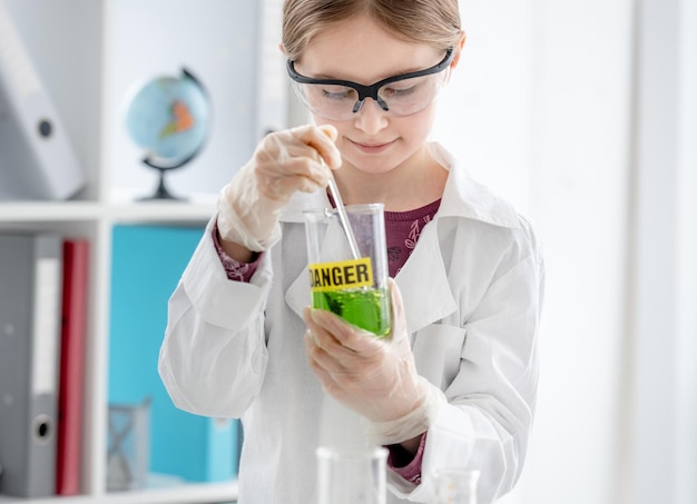 Girl on chemistry lesson