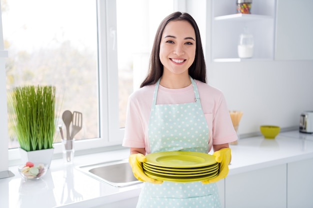 girl cleaning the interior kitchen