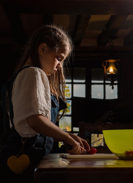 Girl cooking in the kitchen real photo