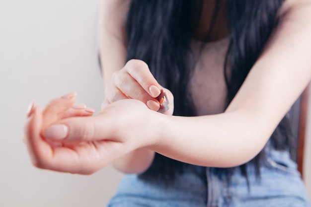 Girl cuts veins with a razor