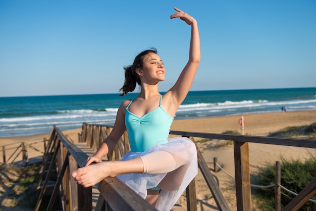 Girl dancing in the beach