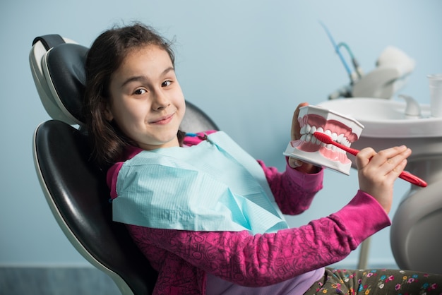 Girl in dentist chair