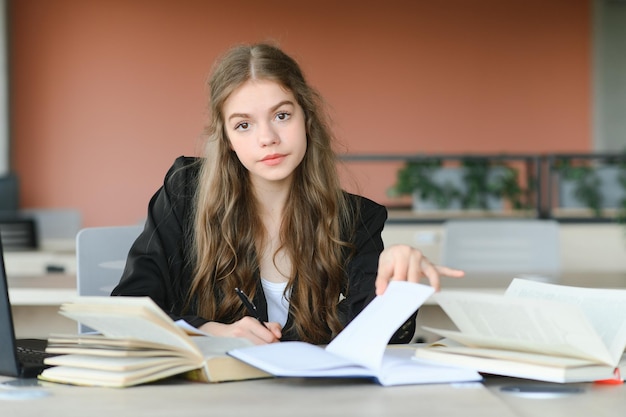 girl at the desk in school