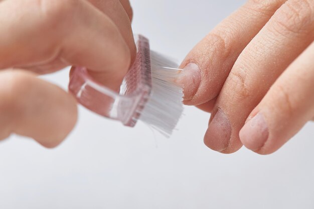 The girl does her manicure at home