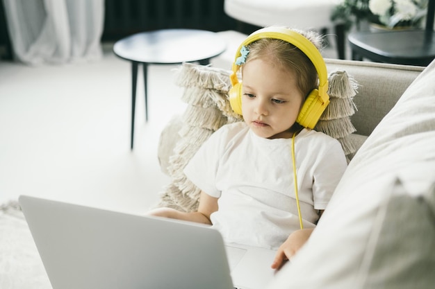 Girl doing e-learning at home