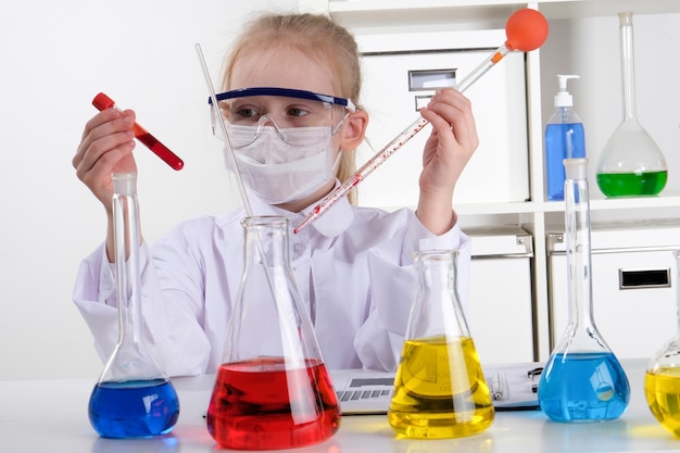 Girl doing experiments in the laboratory