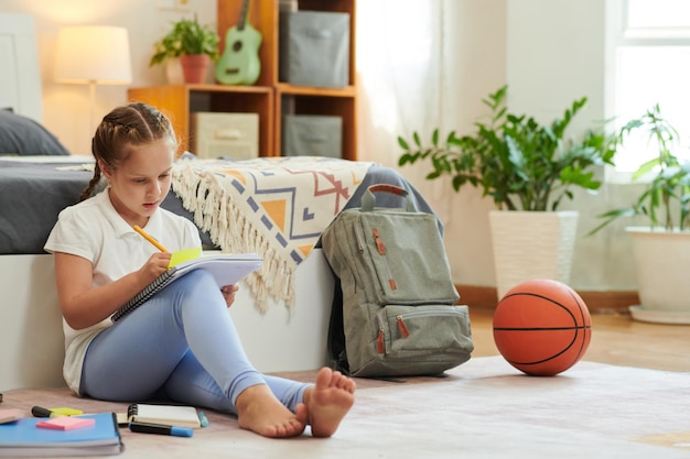 Girl Doing Homework after Classes