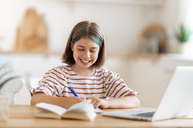 Girl doing homework or online education