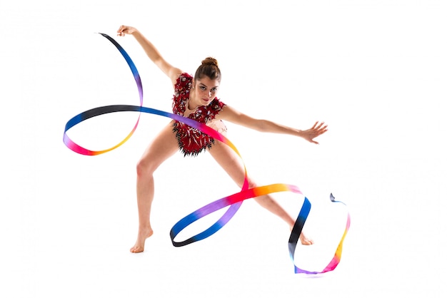 Girl doing rhythmic gymnastics with ribbon 