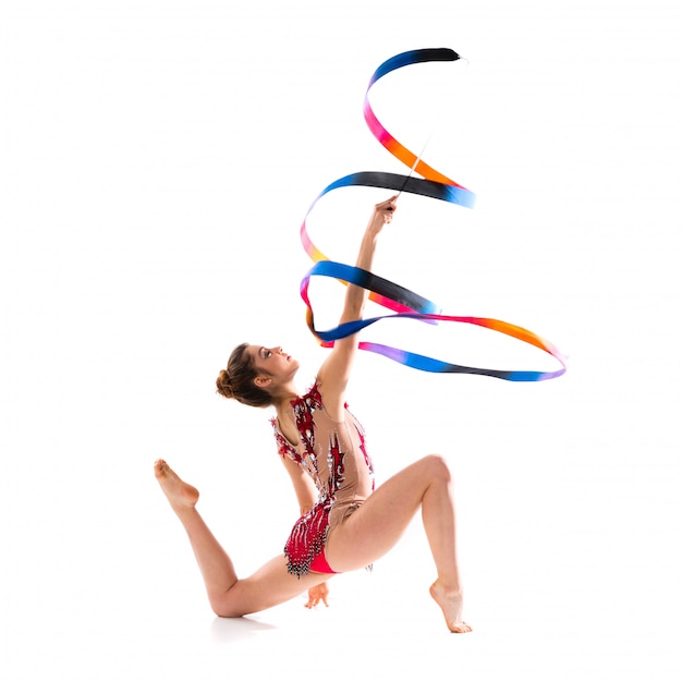 Photo girl doing rhythmic gymnastics with ribbon