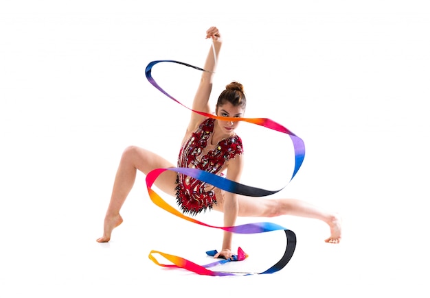 Photo girl doing rhythmic gymnastics with ribbon