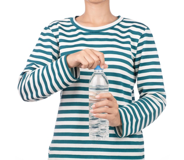 girl dressed in long sleeve shirt hold bottle of water isolated on white background