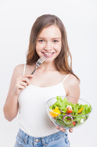 Girl enjoying her fresh salad