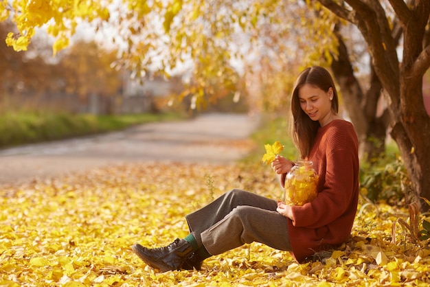 girl enjoying warm autumn in the park hello autumn autumn mood